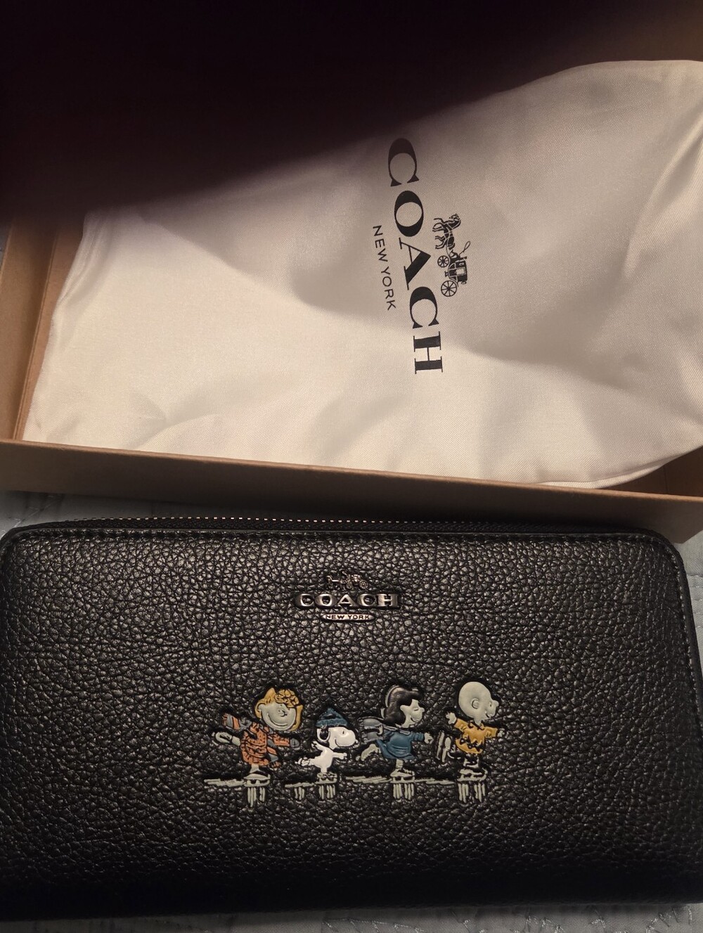 Coach Black Pebble Leather Zip Wallet with Colorful Peanuts Print